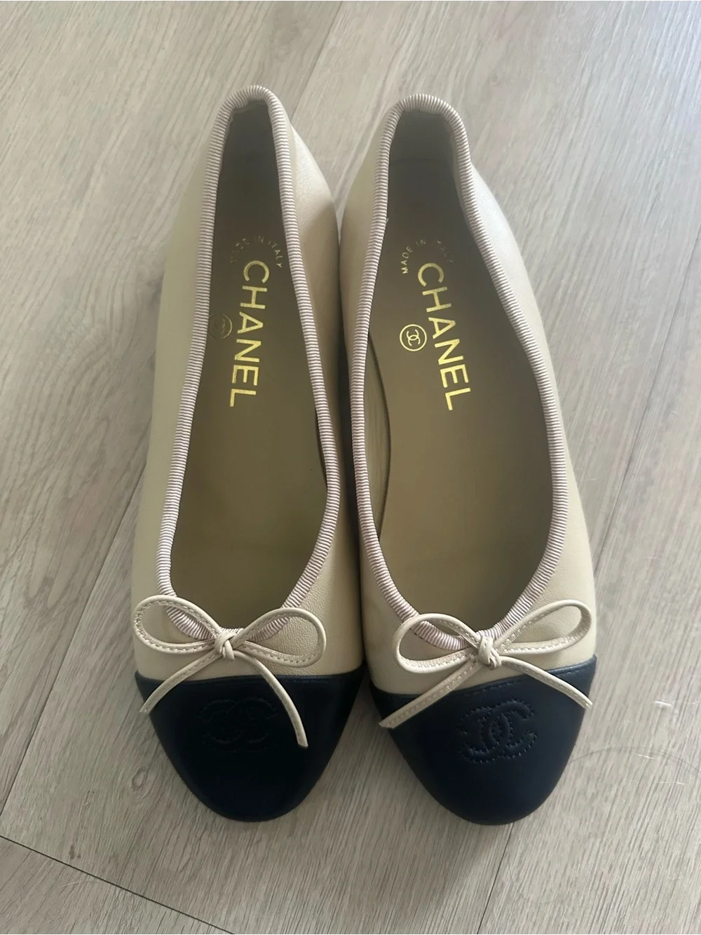 CHANEL Beige Leather Ballet Flats with Black Cap Toe